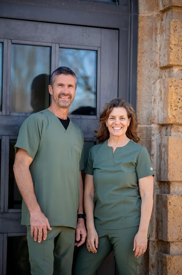 Dr. Mark and Tandi Hechler outside Unity Tower